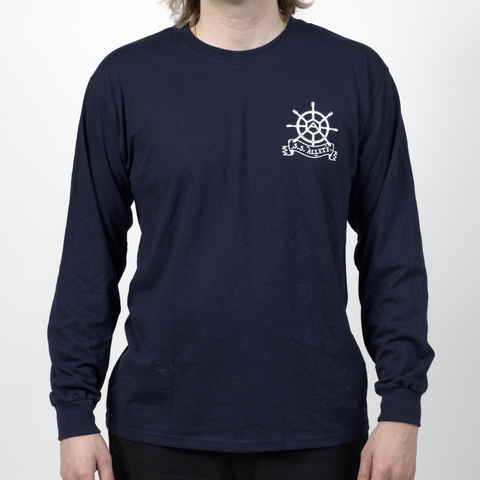 Male model in Navy longsleeve shirt with white graphic on left chest of help with text "S.S. Allete"