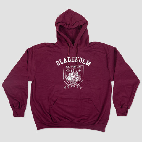 Maroon hoodie with white graphic on front of university shield with text "GLADEHOLM UNIVERSITY MAGICAE EXCELSIOR"