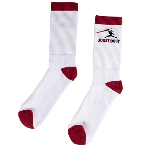 White socks with red accents and 'JOUST DO IT' text and silhouette of knight jousting
