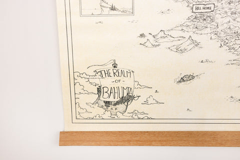 closeup of map showing image of ship in lower left corner with text on sail "THE REALM OF BAHUMIA"