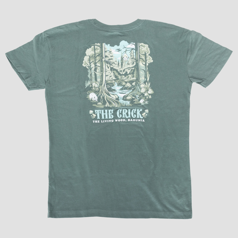 rear view of ladies cut washed royal pine tee with graphic of crick running through forest with text "THE CRICK THE LIVING WOOD, BAHUMIA"