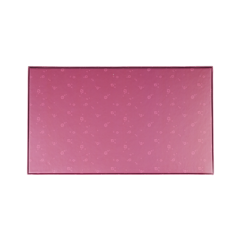 Rear view of rectangular purple puzzle box with subtle pattern on a white background