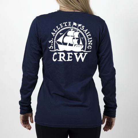 back view of female model in navy longsleeve shirt with white graphic of sailboat surrounded by text "S.S. ALLETE SAILING CREW"