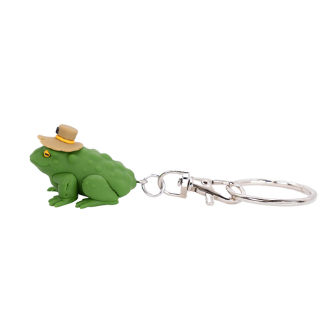 Green frog keychain with a brown hat on a white background