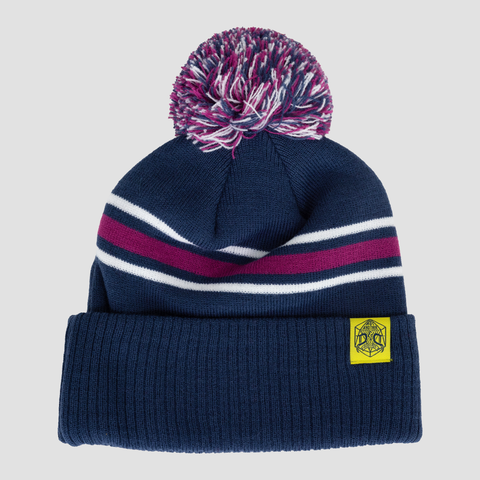 laid flat rear view of Navy purple and white beanie showing yellow naddpod label