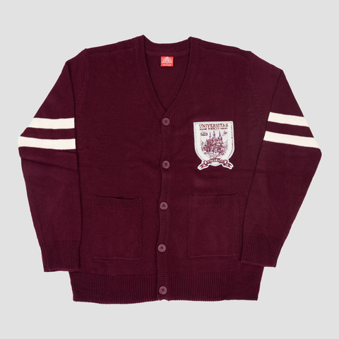 Maroon cardigan with white stripes on sleeves and patch on left chest
