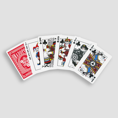 Playing cards spread out showing JOKER King Queen Jack AND Ace with NADDPOD themed graphics along with deck of cards showing red back