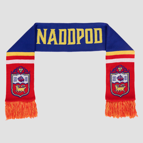 Blue Red Yellow and white scarf with crest on each end, and Yellow text "NADDPOD"