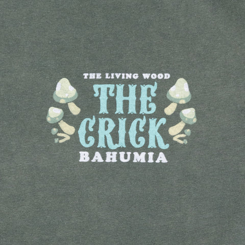 closeup of front text on shirt "THE LIVING WOOD THE CRICK BAHUMIA"