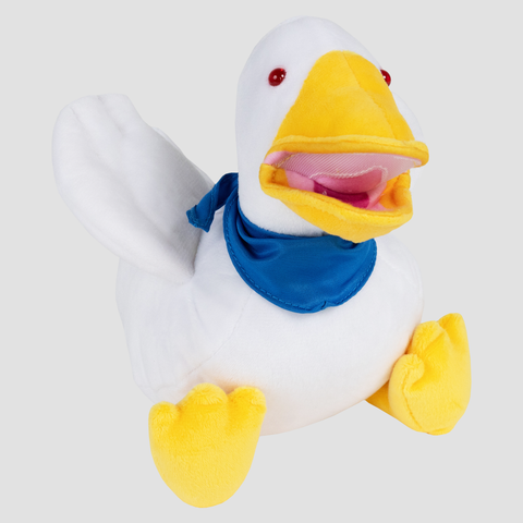 Plush duck with blue handkerchief around neck