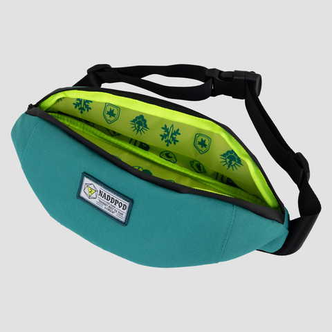 Teal Fanny pack with patch with text "NADDPOD SHOUT OUT TO THE 2 CREW" showing green interior with graphics