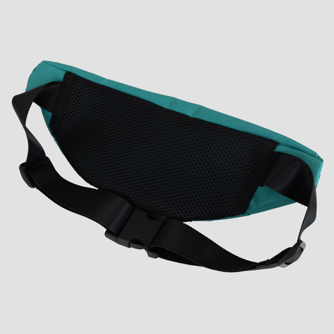 rear view of teal fanny pack showing strap and black mesh back