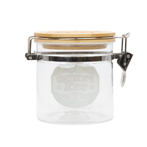 rear view of glass jar with wooden lid